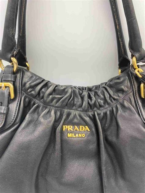 bolsa preta da prada